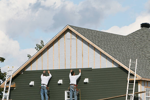 Professional Vinyl Siding technician working in Maywood, IL
